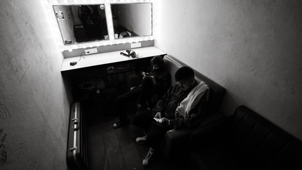 Man sitting on a Sofa in dressing room